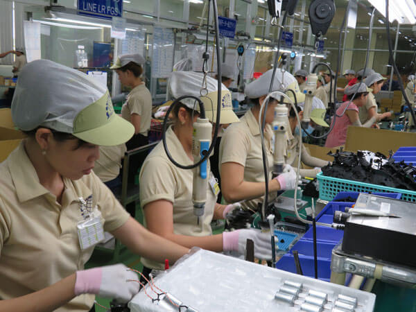 A factory in Vietnam an its local staff