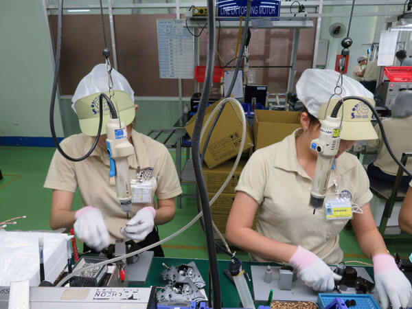 A factory in Vietnam an its local staff